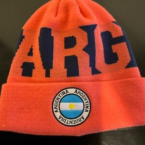 Argentina Knit Beanie in Orange and Blue